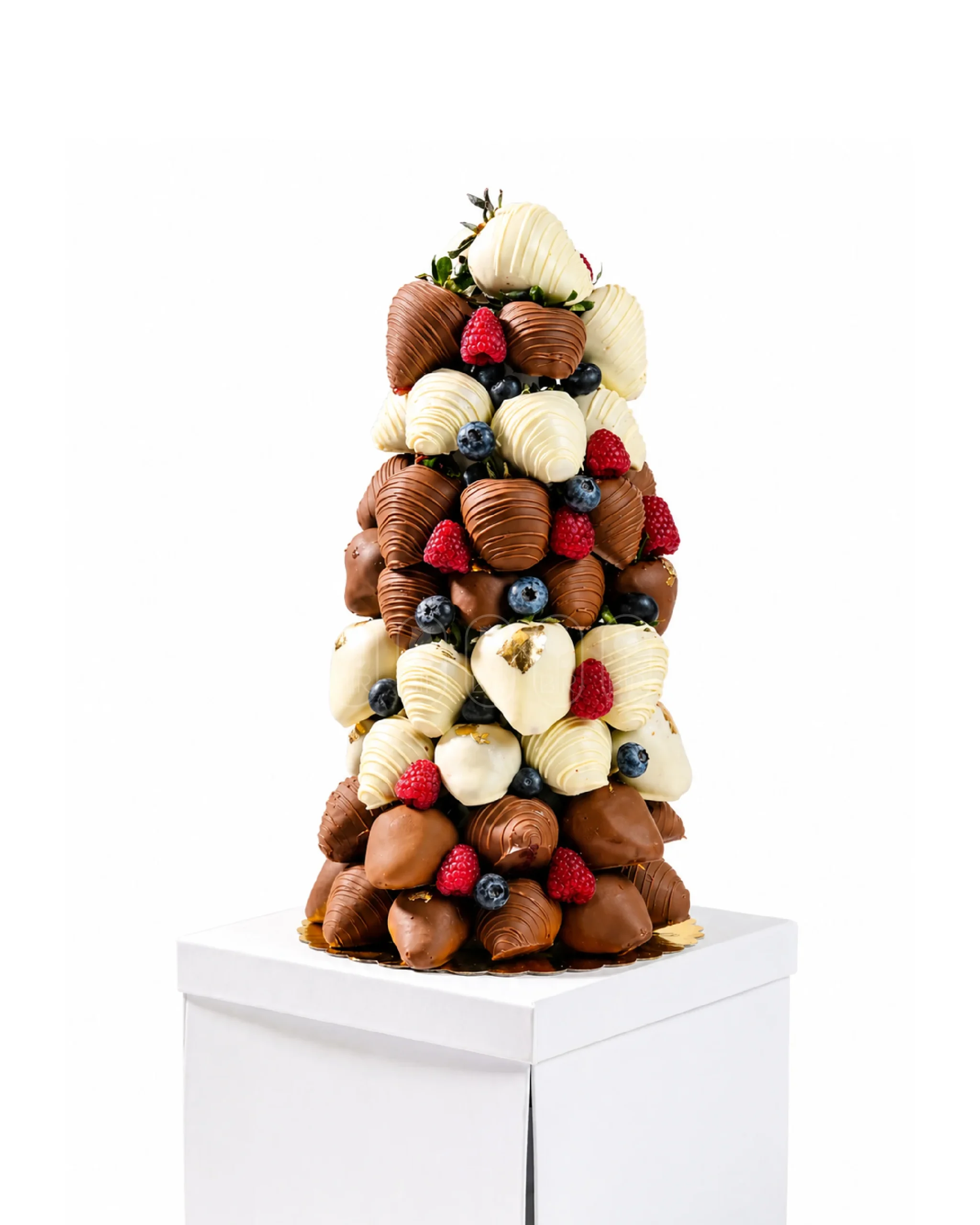 Luxury strawberry tower with milk chocolate, white chocolate, and fresh berries beautifully arranged for elegant gifting