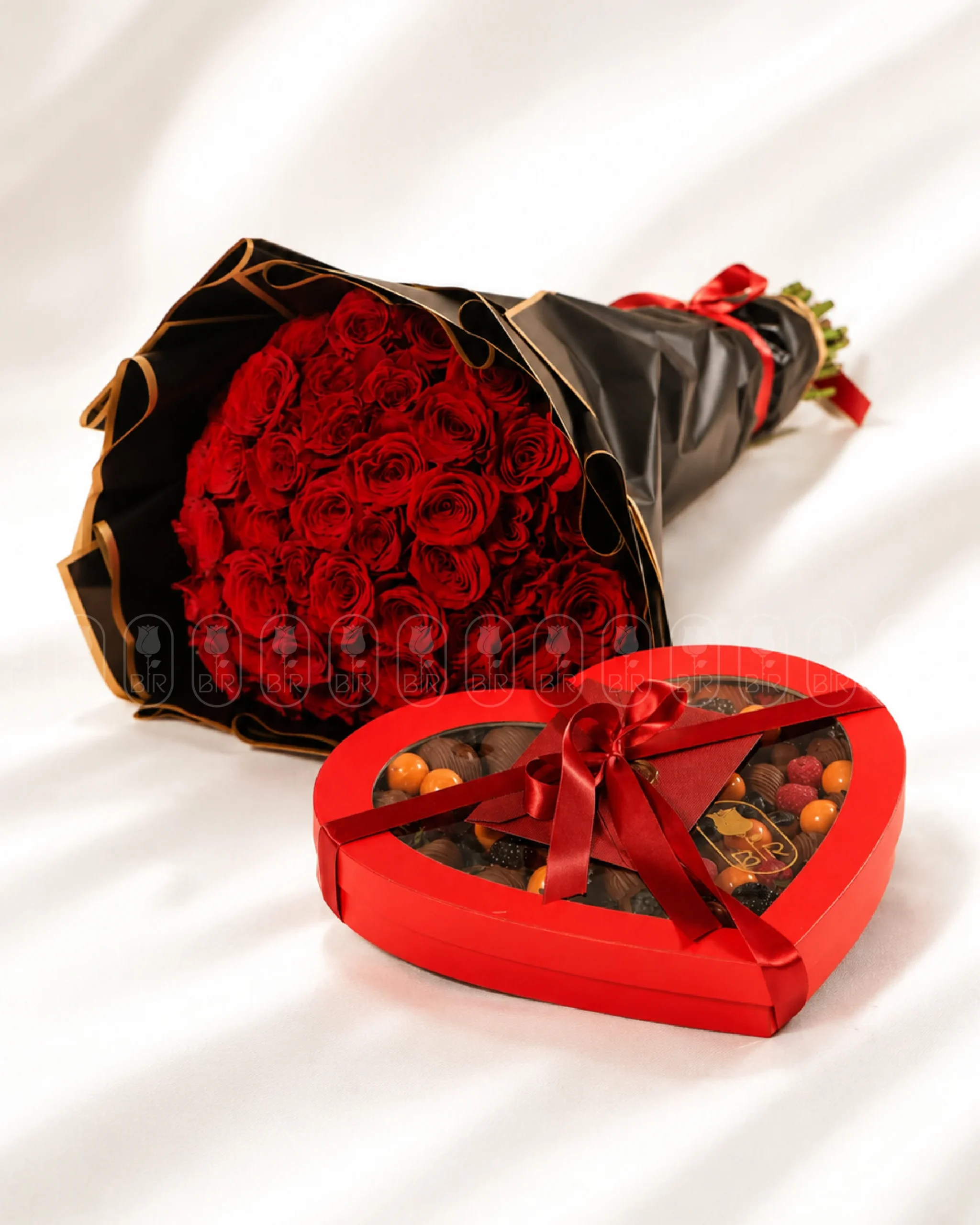Luxury red rose bouquet with heart-shaped Belgian chocolate strawberry box