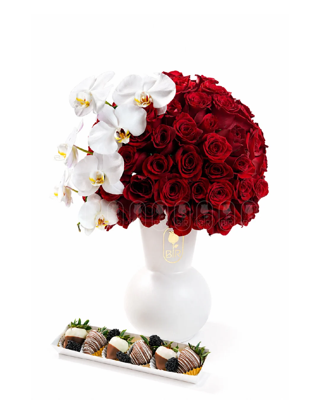 Red rose dome arrangement with white orchids and chocolate-covered strawberries