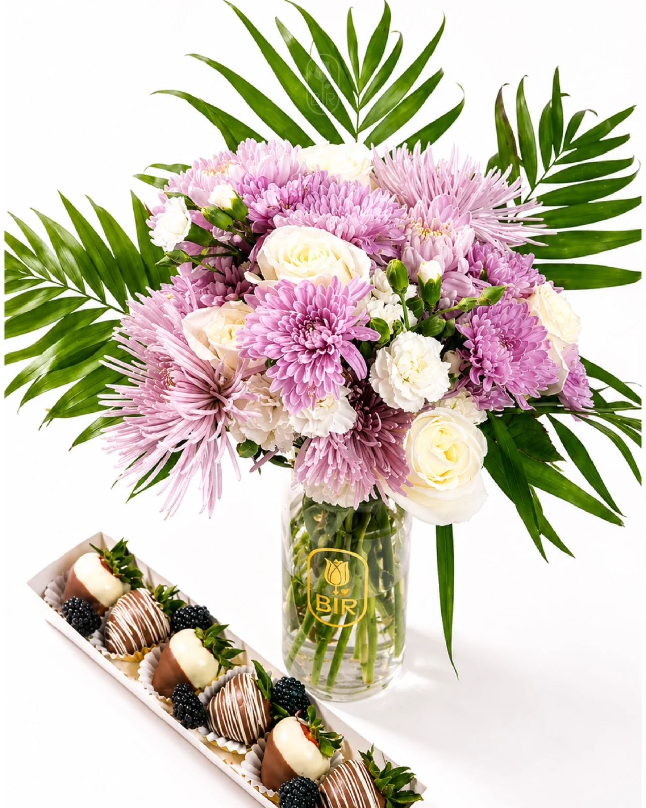 Elegant lavender chrysanthemum and white rose arrangement with chocolate-covered strawberries